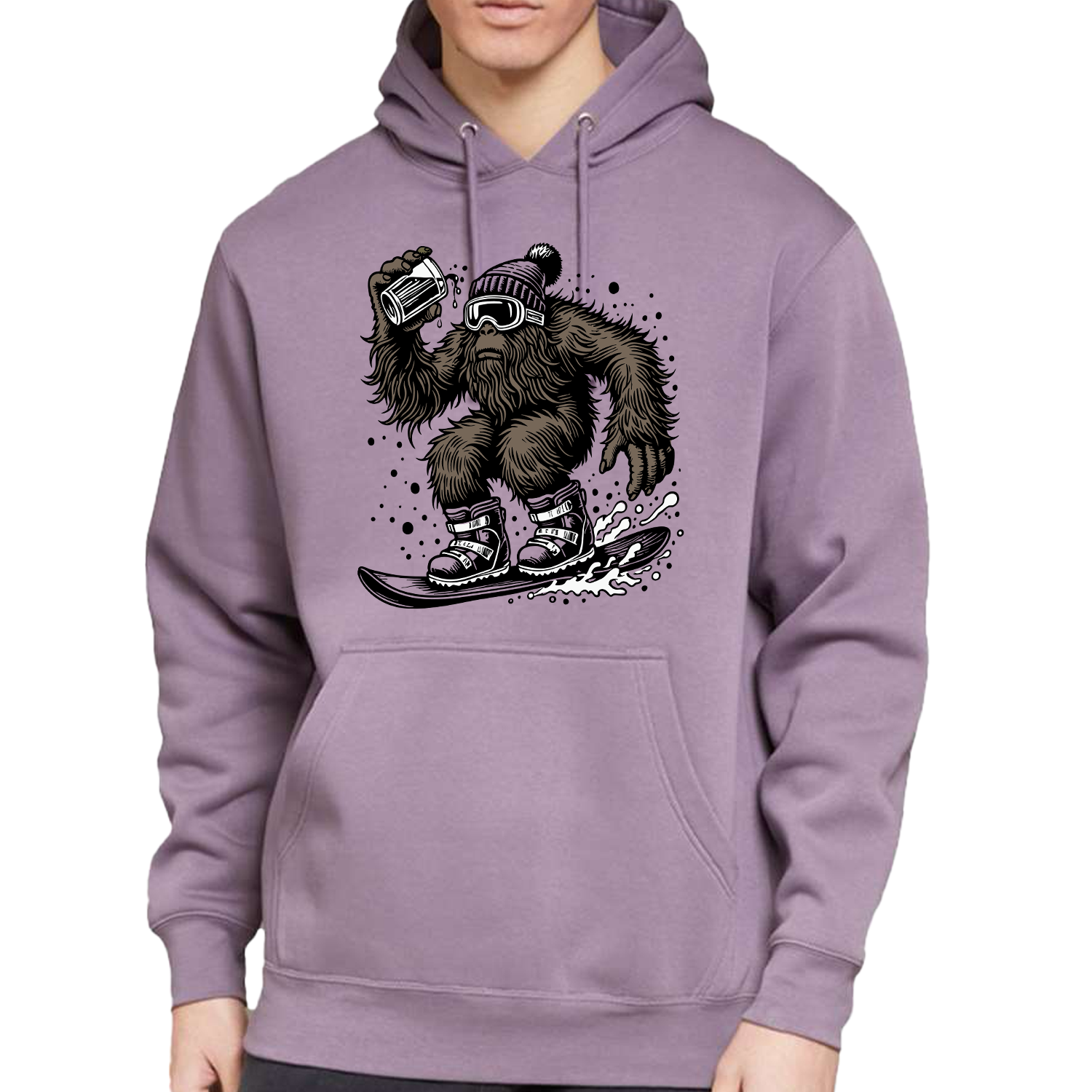 Purple pullover hoodie featuring a graphic of Bigfoot (Sasquatch) with a beard, goggles, and a beanie, actively snowboarding. Bigfoot is holding a can in one hand.
